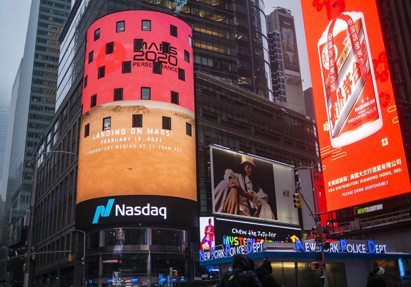 The Nasdaq tower in Times Square, lit at night